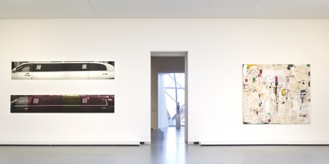 Two of Adam McEwen's limousine works hang together vertically. His work is pictured alongside other works included at La Fondation Louis Vuitton.